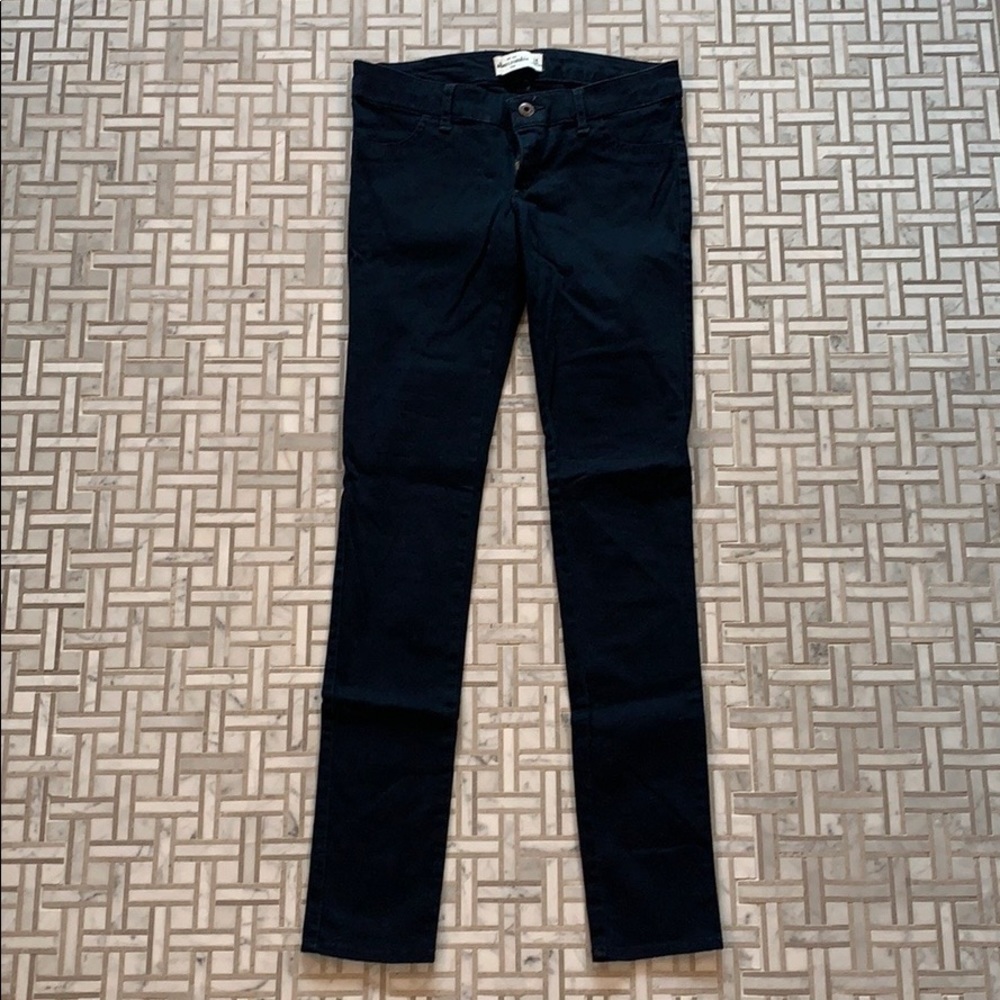 Navy blue skinny jeans. Never worn.